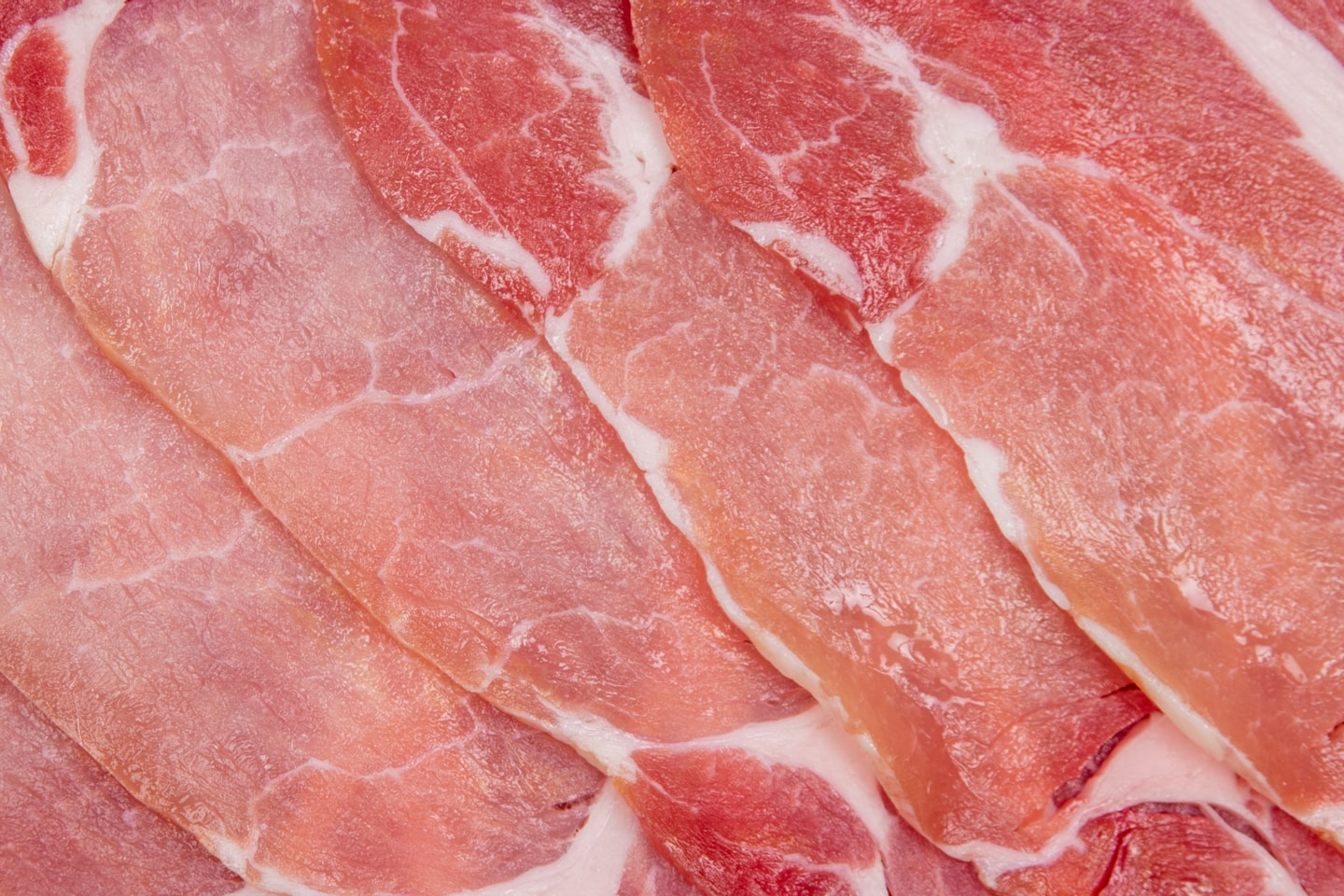 raw meat on white surface