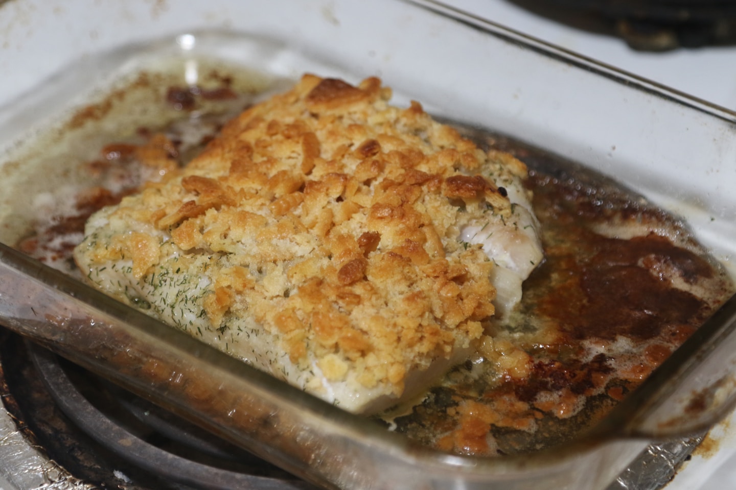 A casserole dish sitting on top of a stove